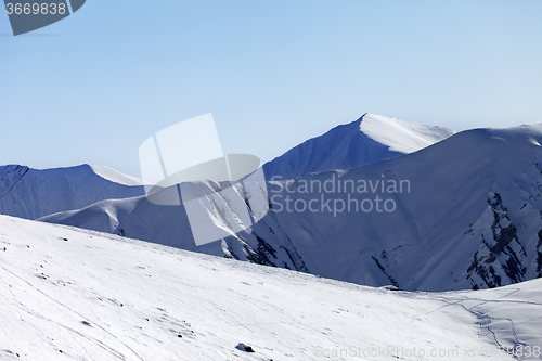 Image of Off-piste slope at nice sunny morning