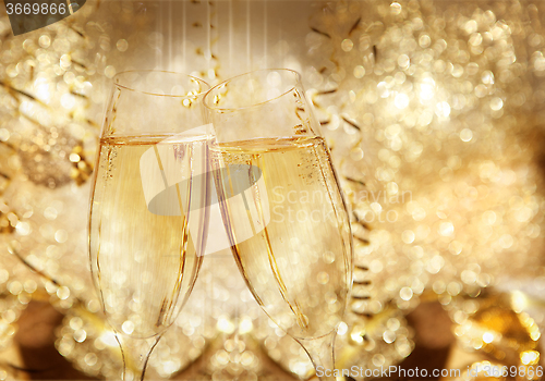 Image of New Year champagne clink glasses