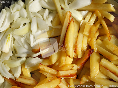 Image of Potato chips and cutting onions