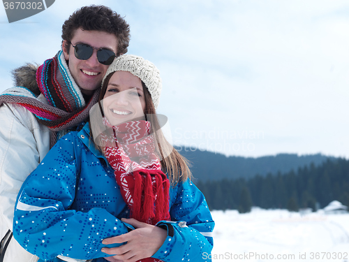 Image of romantic young couple on winter vacation
