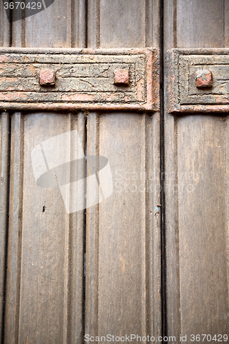 Image of in london antique brown door  rusty  brass light