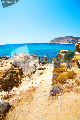 Image of in greece the mykonos island rock sea and beach blue   sky