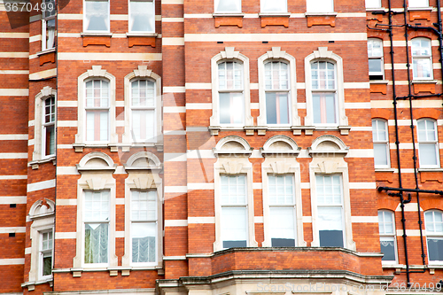 Image of window in   old red brick       historical 