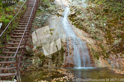 Image of At the waterfall   