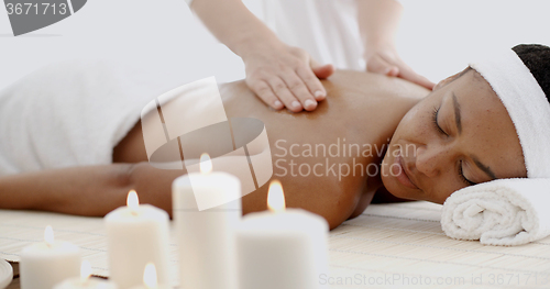 Image of Young Woman Having A Massage In A Spa