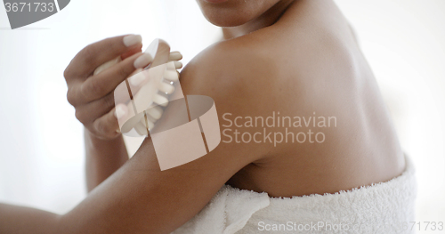 Image of Woman Massaging Her Shoulder