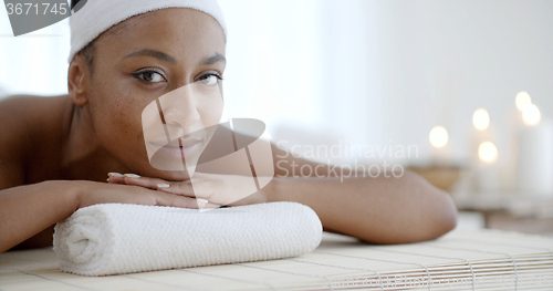 Image of Woman Relaxing On A Pillow