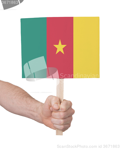 Image of Hand holding small card - Flag of Cameroon