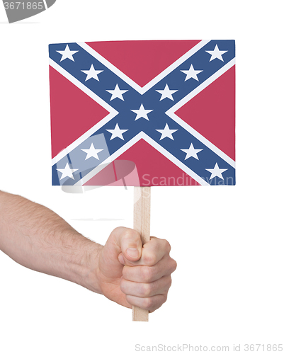 Image of Hand holding small card - Flag of the Confederacy
