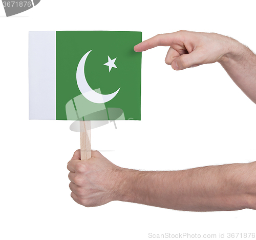 Image of Hand holding small card - Flag of Pakistan