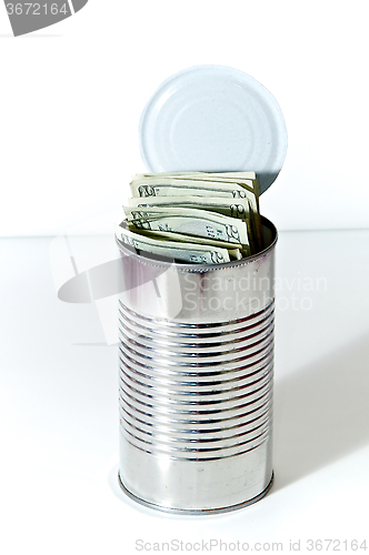 Image of soup can full of money