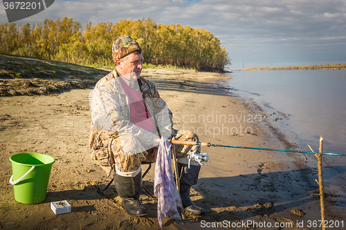 Image of Fisherman at the river