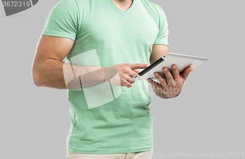 Image of Man working with a tablet, 