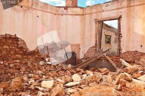 Image of rubble and fireplace