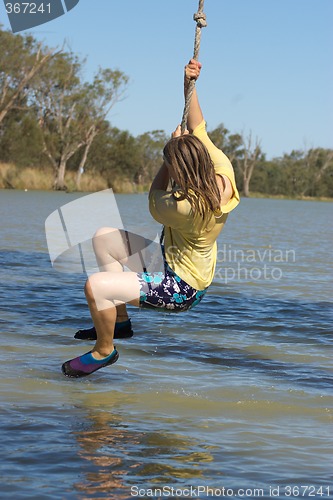 Image of girl swinging