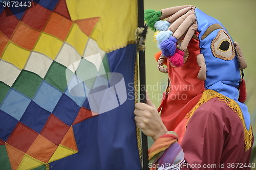 Image of Man in mask celebrating solstice holiday. 