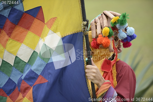 Image of Man in mask celebrating solstice holiday. 