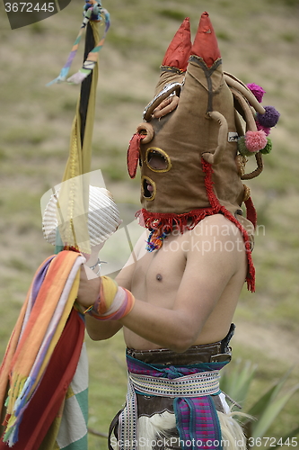 Image of Man in mask celebrating solstice holiday. 