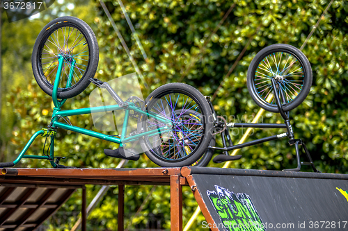 Image of bmx extreme team making stunt in downtown york south carolina at