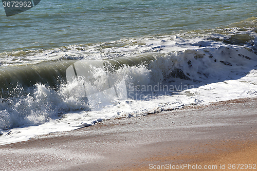 Image of Wave on the sand beach