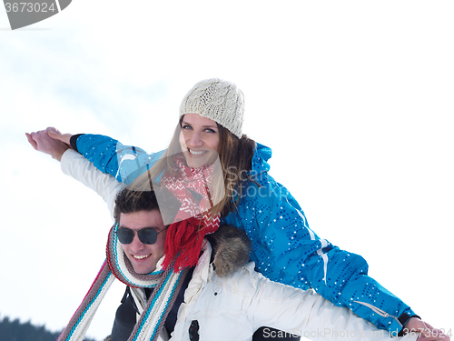 Image of romantic young couple on winter vacation
