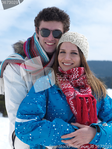 Image of romantic young couple on winter vacation