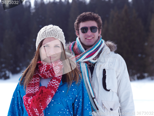 Image of romantic young couple on winter vacation