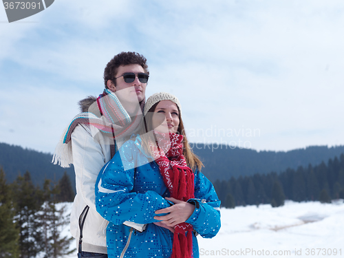 Image of romantic young couple on winter vacation