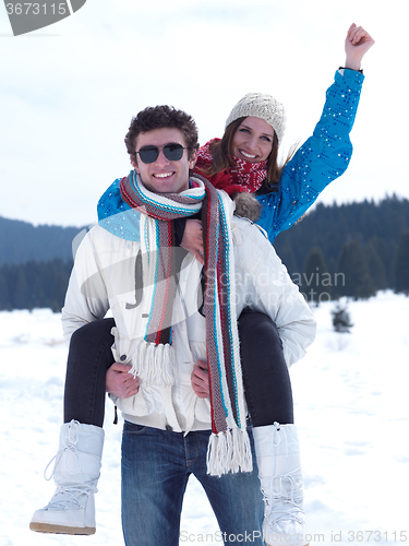 Image of romantic young couple on winter vacation