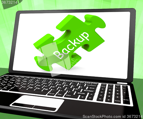Image of Backup Laptop Shows Data Archiving Back Up And Storage