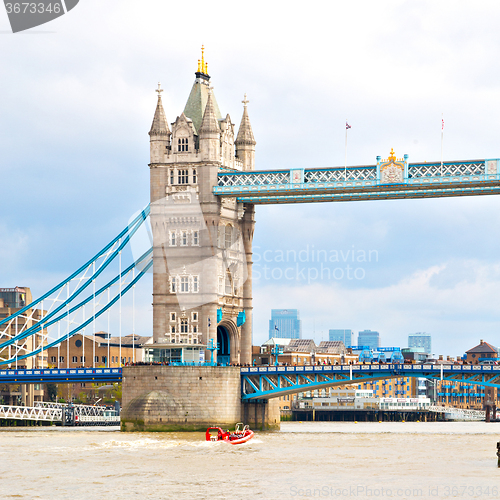 Image of london tower in england old bridge and the cloudy sky