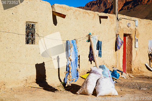 Image of bags  roof  moroccan old wall and brick in antique city