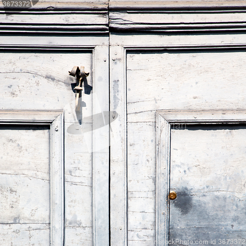 Image of  traditional   door    in italy   ancian wood and traditional  t