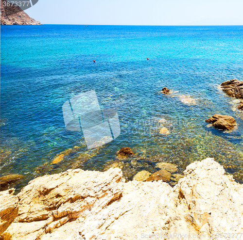 Image of in greece the mykonos island rock sea and beach blue   sky