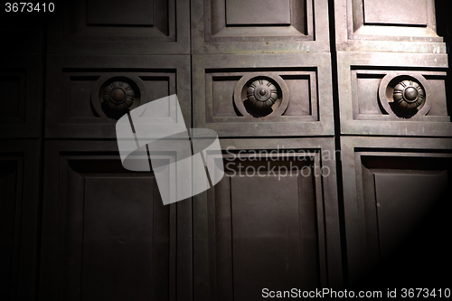 Image of in london antique brown door  rusty  brass nail and light