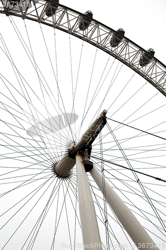 Image of london eye in  white clouds