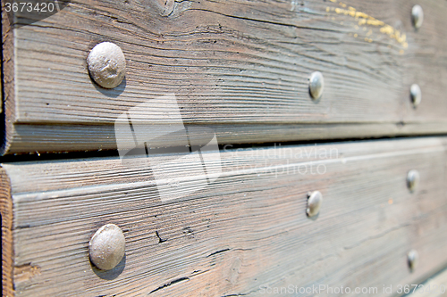 Image of abstract texture of a brown antique  in italy   