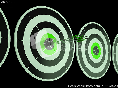 Image of Triple Dart Shows Focused Successful Aim
