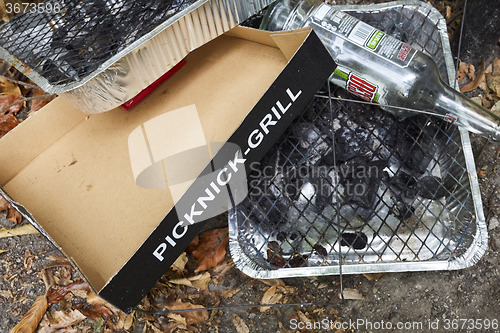 Image of Picknick litter lying on ground