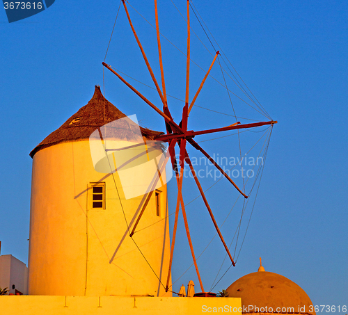 Image of old mill in santorini greece europe  and the sky sunrise