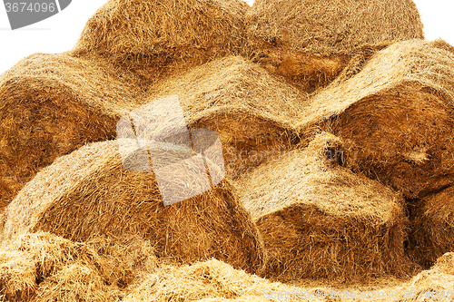 Image of haystacks piled straw 