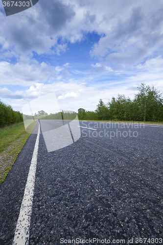 Image of asphalt road  . spring