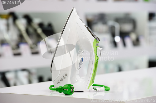 Image of electric iron in retail store