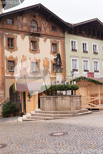 Image of Berchtesgaden, Germany, Bayern 11/29/2015: Advent wreath on a fountain at the Advent market in Berchtesgaden