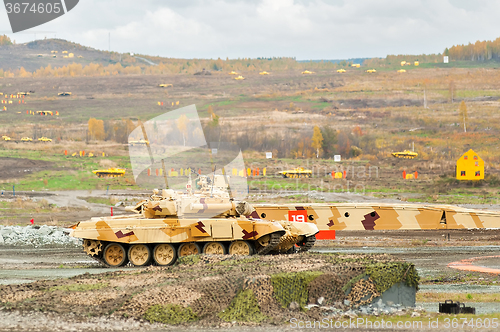 Image of Tank T-90S in motion. Russia