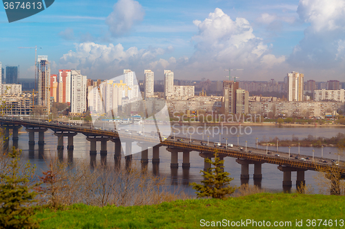 Image of Long bridge with traffic in Kiev Ukraine