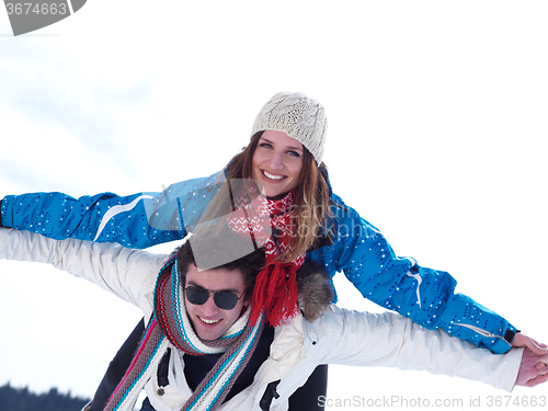 Image of romantic young couple on winter vacation