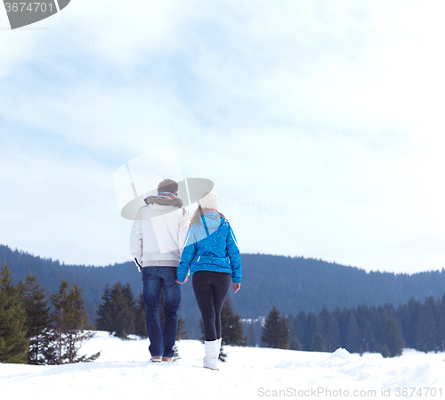 Image of romantic young couple on winter vacation