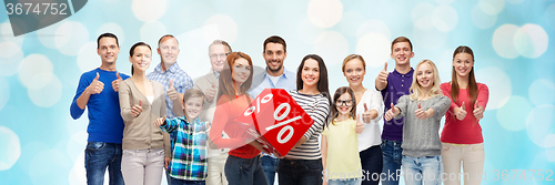 Image of happy people red percentage sign showing thumbs up