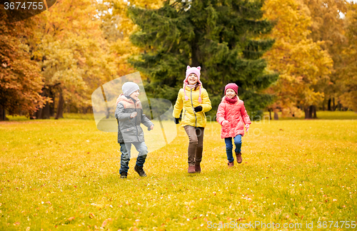 Image of group of happy little kids running outdoors